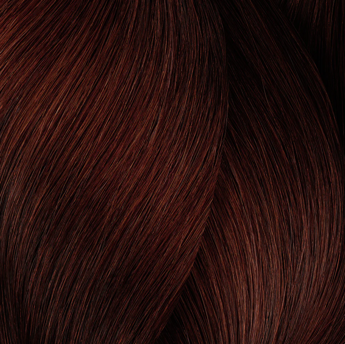 a close up of a red hair color