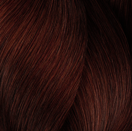 a close up of a red hair color